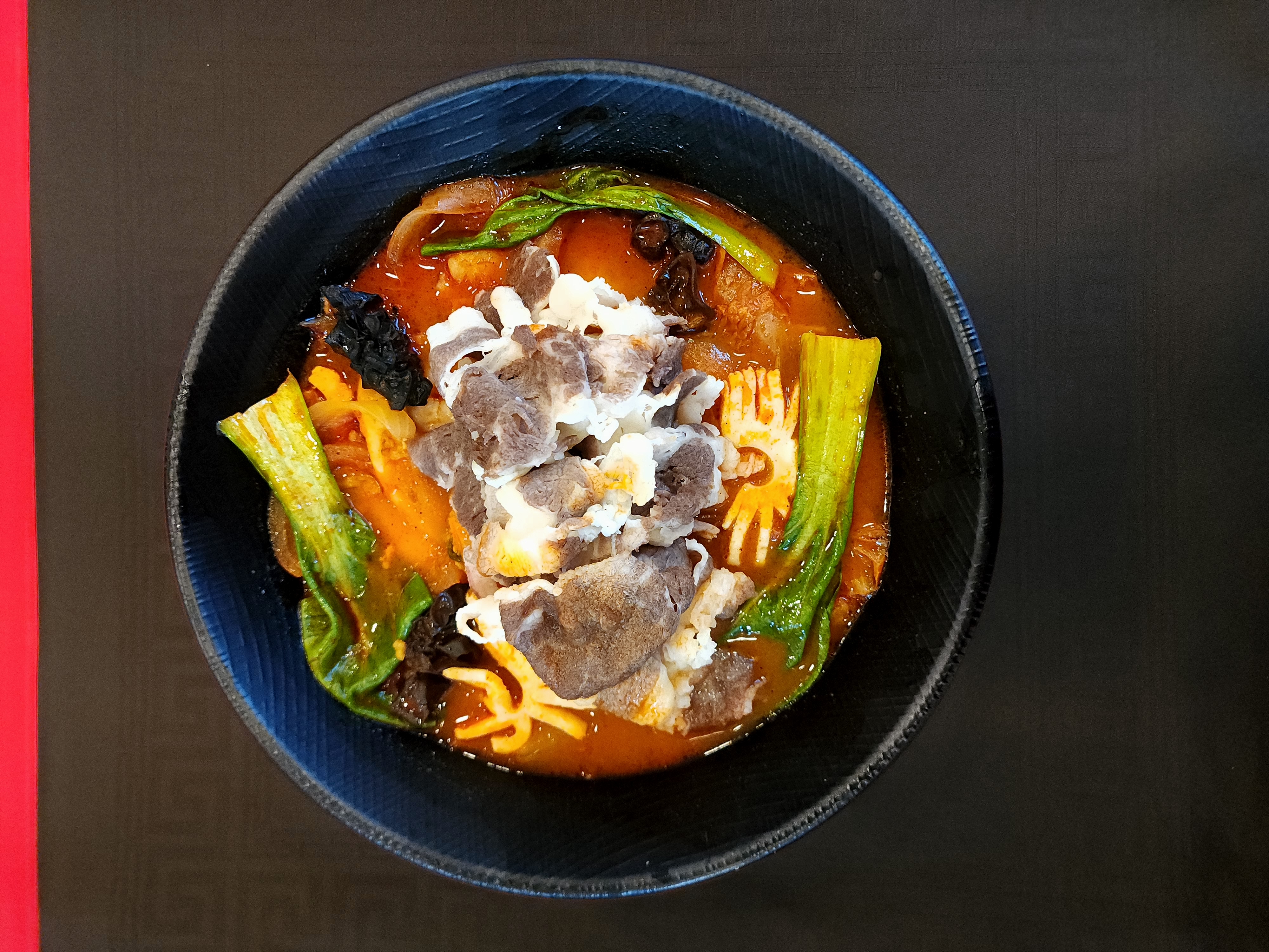 Spicy Seafood Noodle Soup with Beef Brisket