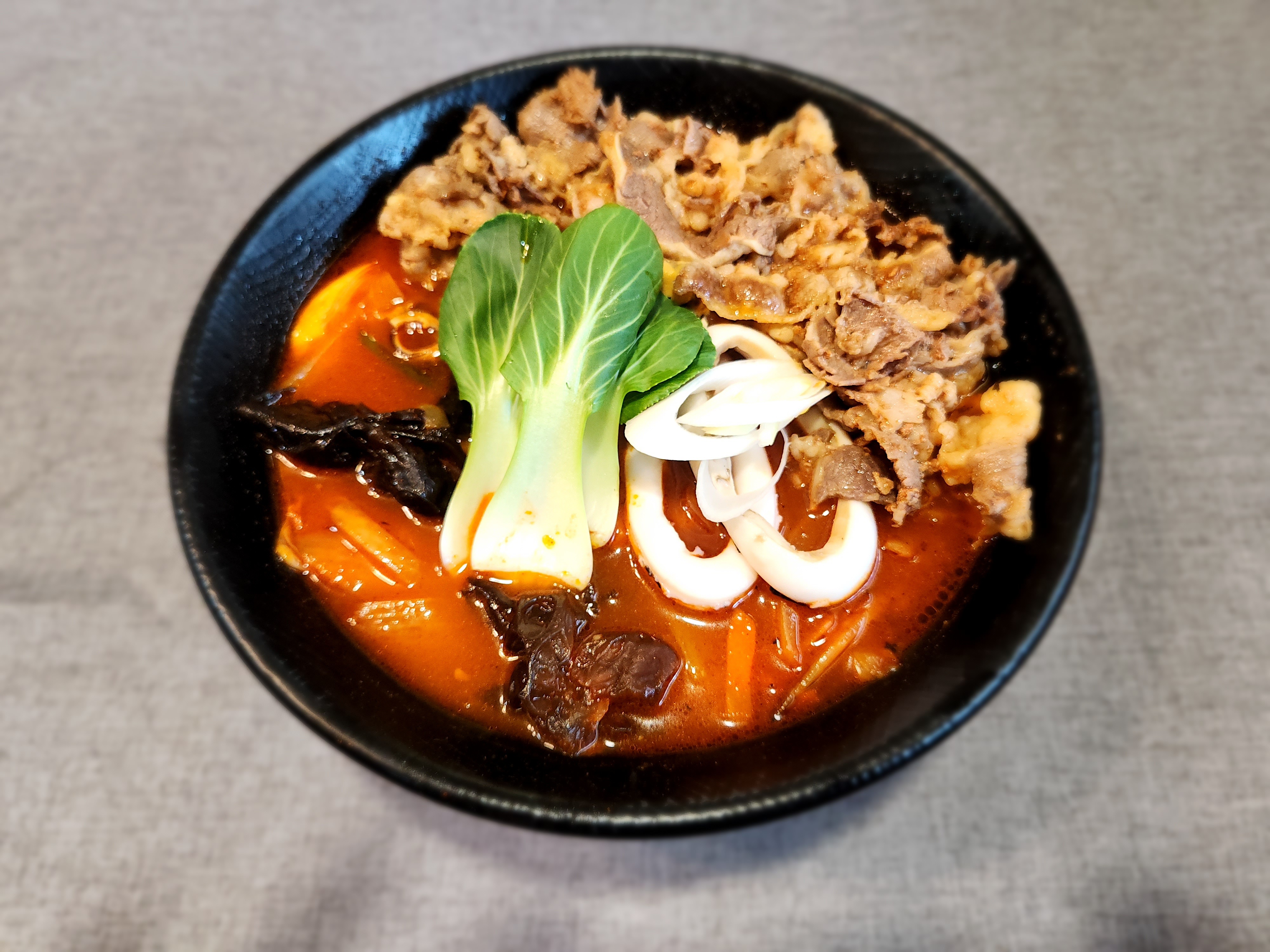 Spicy Seafood Noodle Soup with Brisket