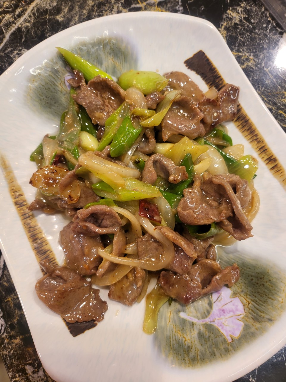 Stir-fried lamb with green onions
